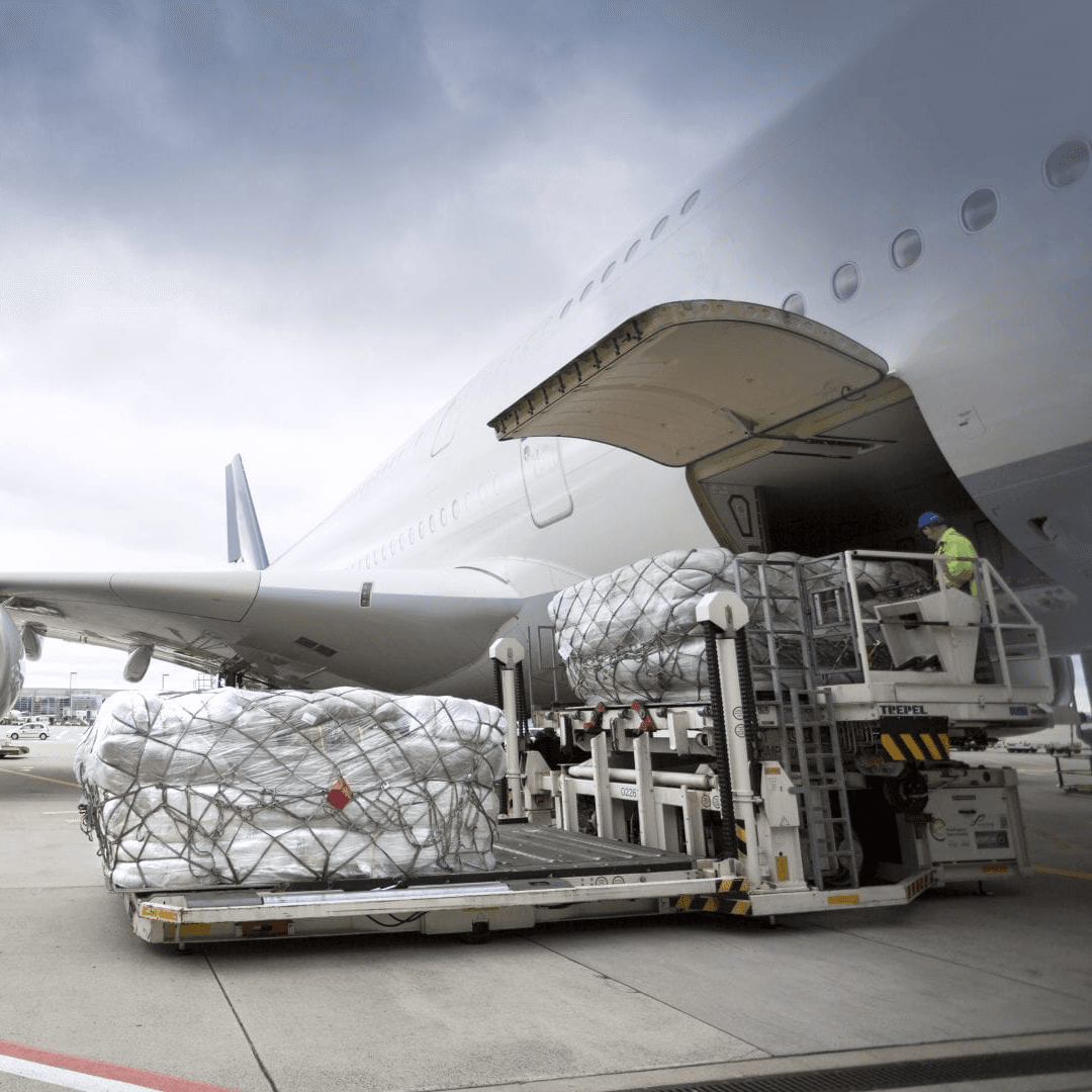 Air cargo pallets being loaded into an aircraft's cargo hold